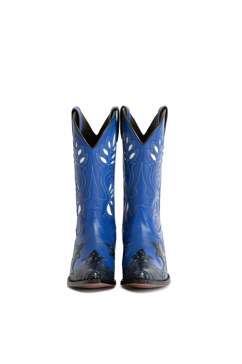 A handcrafted blue cowboy boot with intricate decorations, a cushioned insole, and a pointed toe.