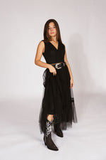 Woman wearing a black dress with sheer overlay and  handmade stingray black boots-RockiesRebels