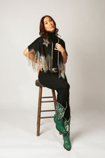 Lifestyle: styling emerald green stingray cowboy boots with urban fashion