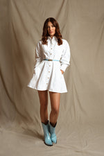 Model wearing George Lake light blue python cowgirl boots –