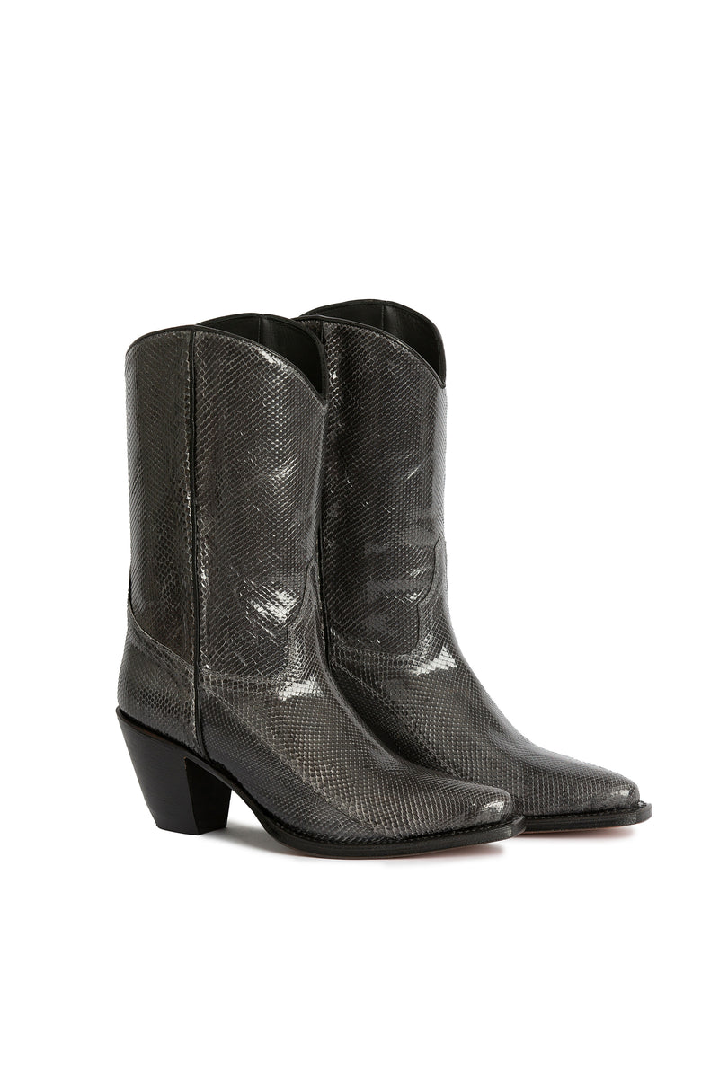 Close-up: grey python leather pattern on cowboy boots