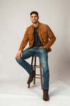 Model styling Bald Eagle Brown stingray cowboy boots with urban outfit