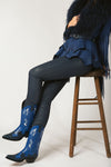 Model styling Bear Canyon Blue ostrich cowboy boots with western fashion 