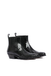 Close-up: black python leather scales on Hidden Lake boots