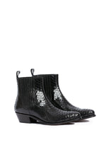Close-up: black python leather scales on Hidden Lake boots