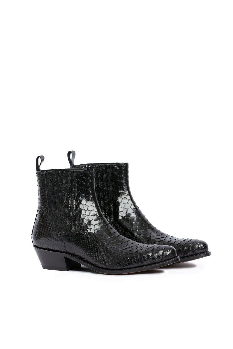 Close-up: black python leather scales on Hidden Lake boots